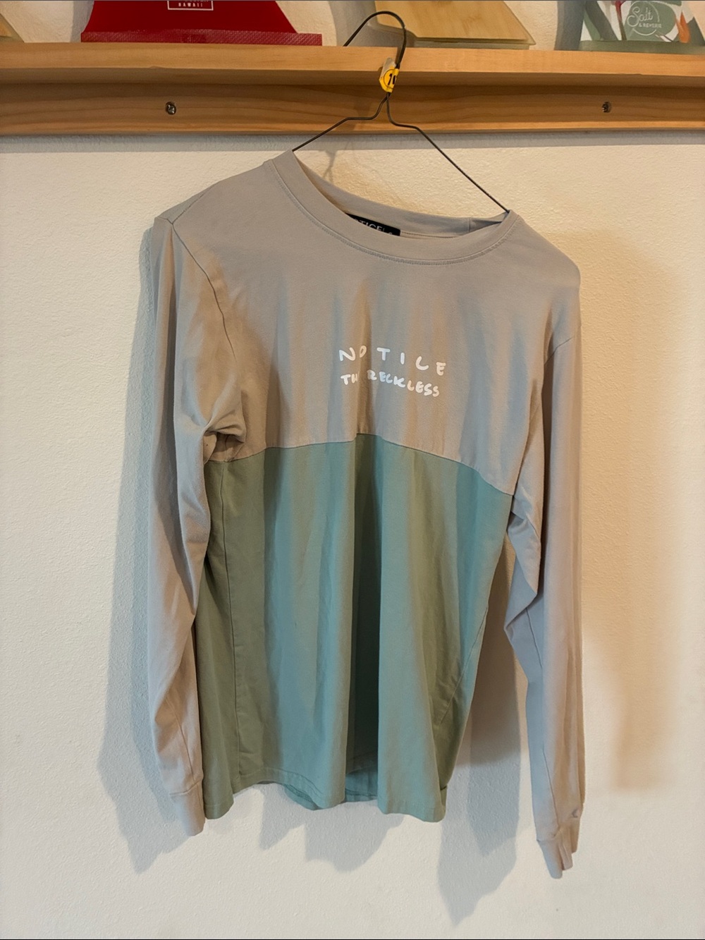 Notice the reckless long sleeve